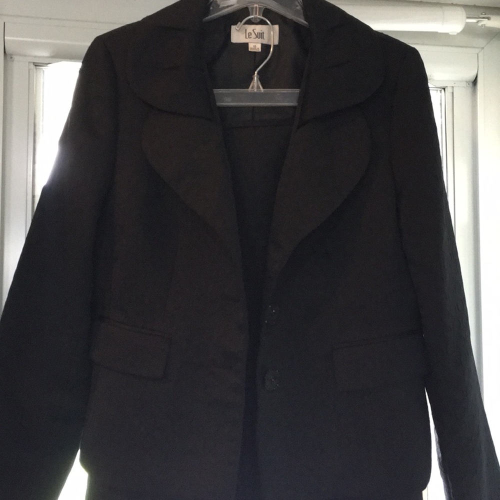 Two piece Black polyester suit .
